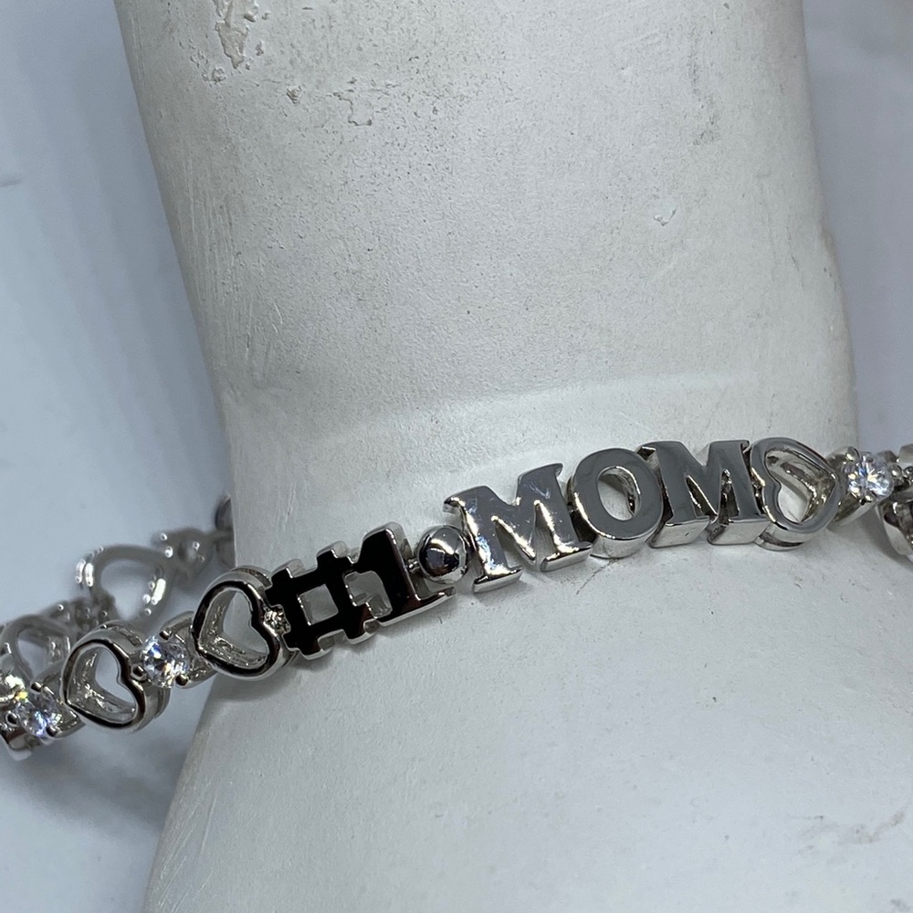 Sterling silver/ CZ #1 MOM tennis bracelet. 7”